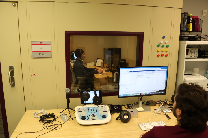 Sam and Cheng-Han operating software in the AMP Lab.